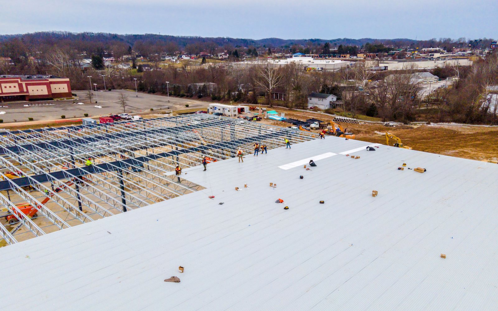 Aerial view of structural framing and roof progress