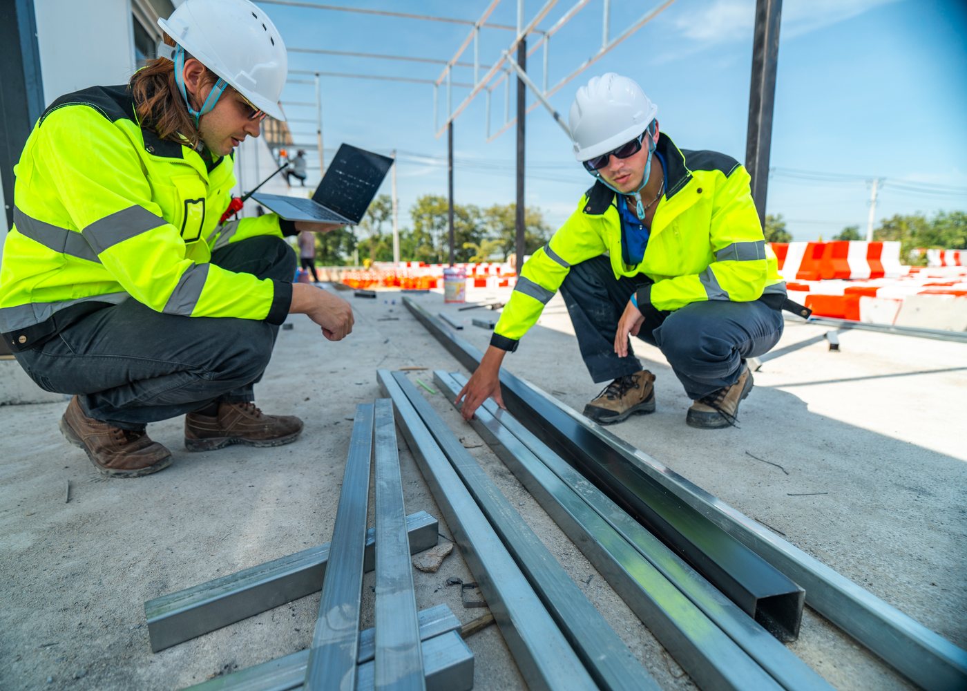 Construction professionals reviewing project details on site